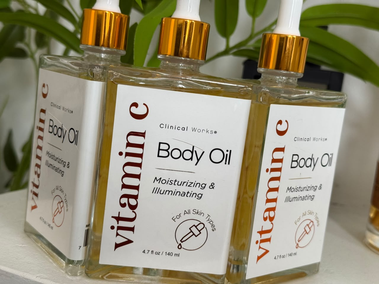 Clinical Works Vitamin C Body Oil Beauty product photo at Sylvia Glow House, Vitamin C body oil for radiant-looking skin., for Glow & moisture, Body oil texture, gallery view 2