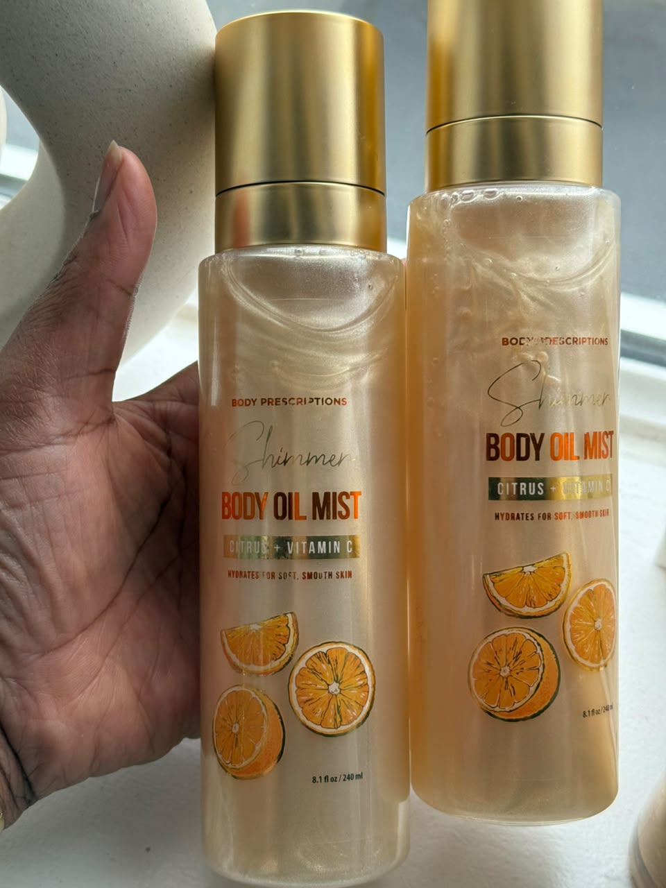 Body Prescriptions Citrus + Vitamin C Shimmer Body Oil Mist Beauty product photo at Sylvia Glow House, A luminous citrus body oil mist., for Glow & moisture, Oil mist texture, gallery view 2